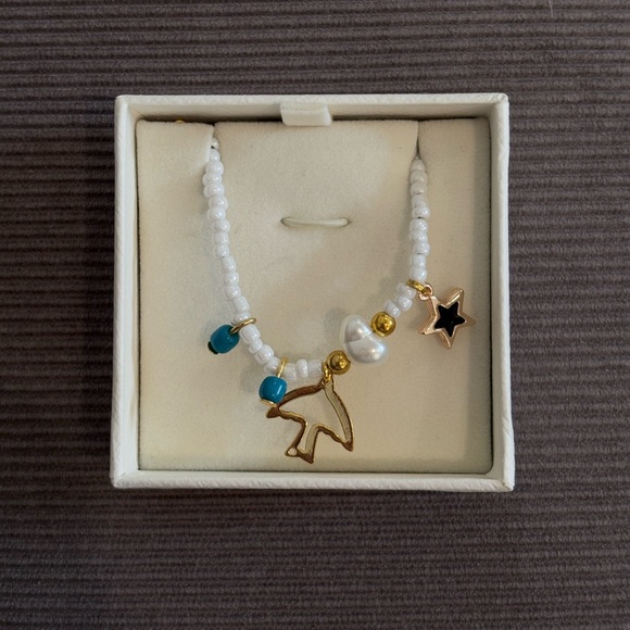 Jewelry - Handmade White Beaded Necklace with Gold Star and Charm